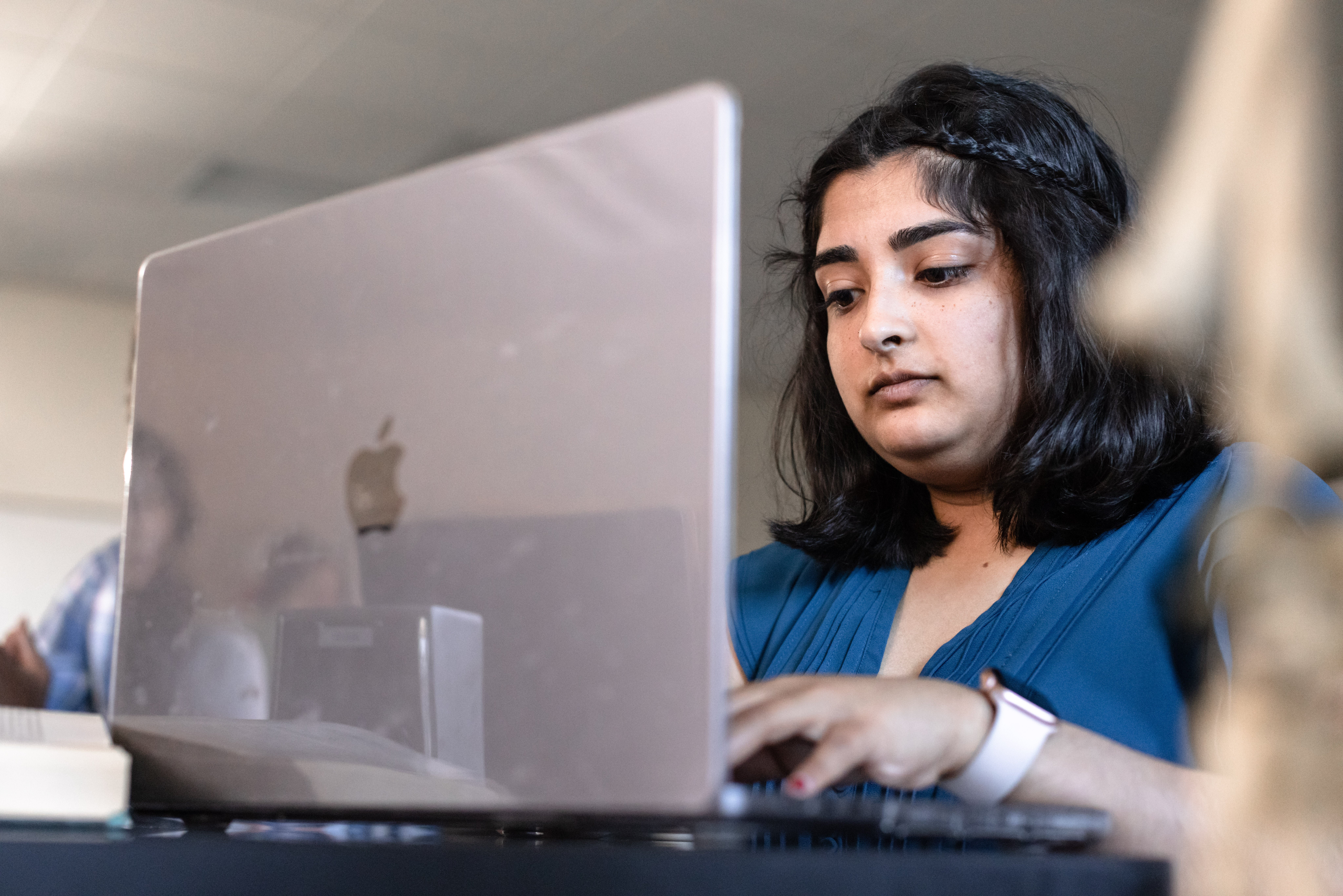 Download the App | Person with Laptop