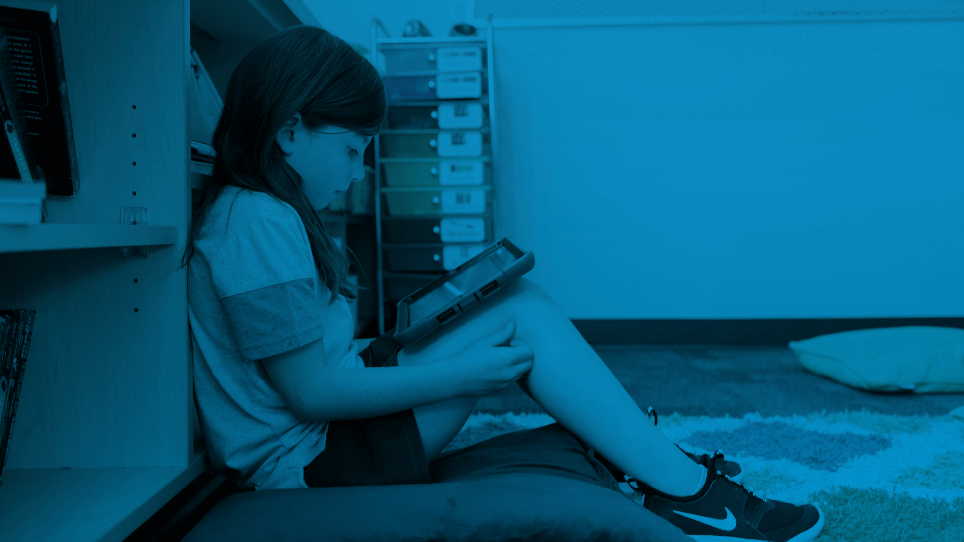 A student using Canvas on tablet