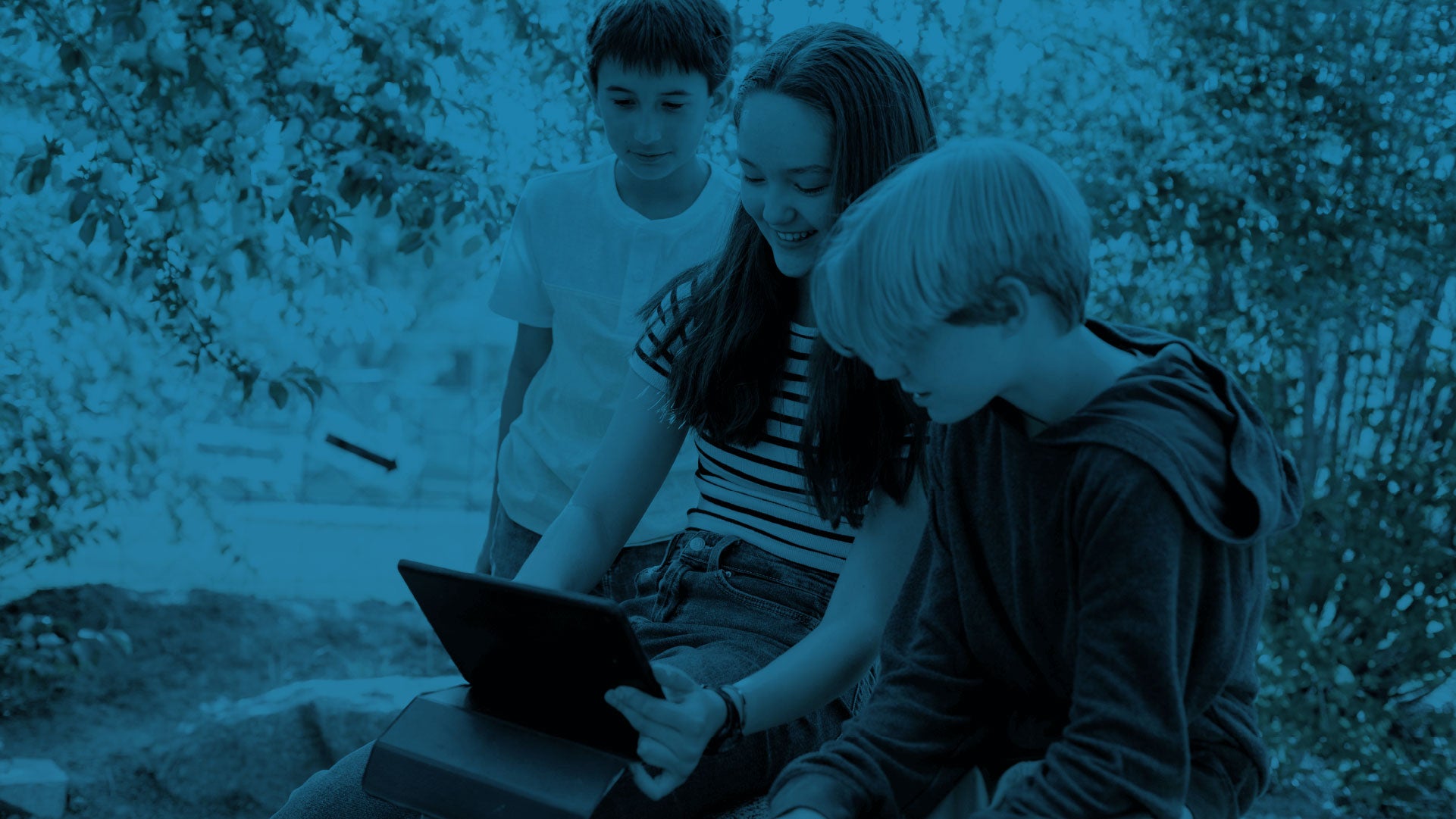 Students using Canvas on a tablet