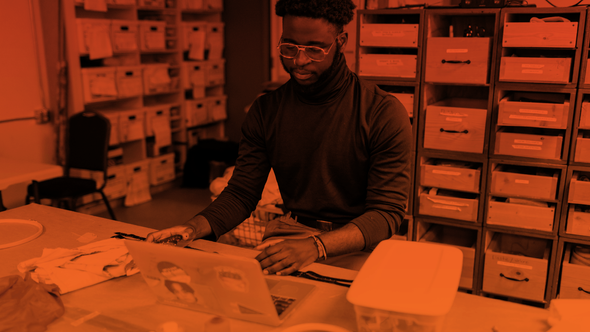A student opening Canvas on a laptop