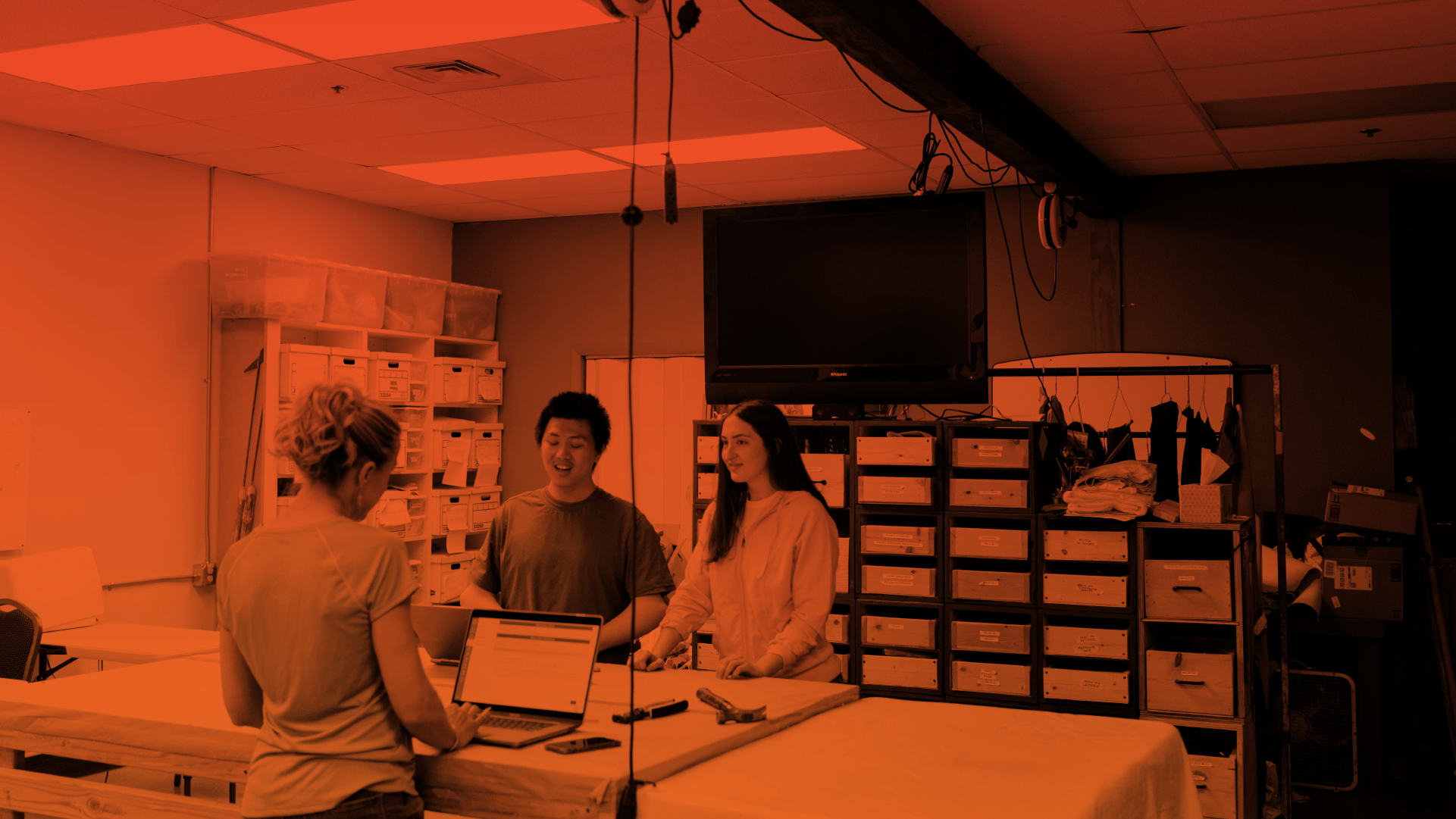 Students opening Canvas on their laptops 