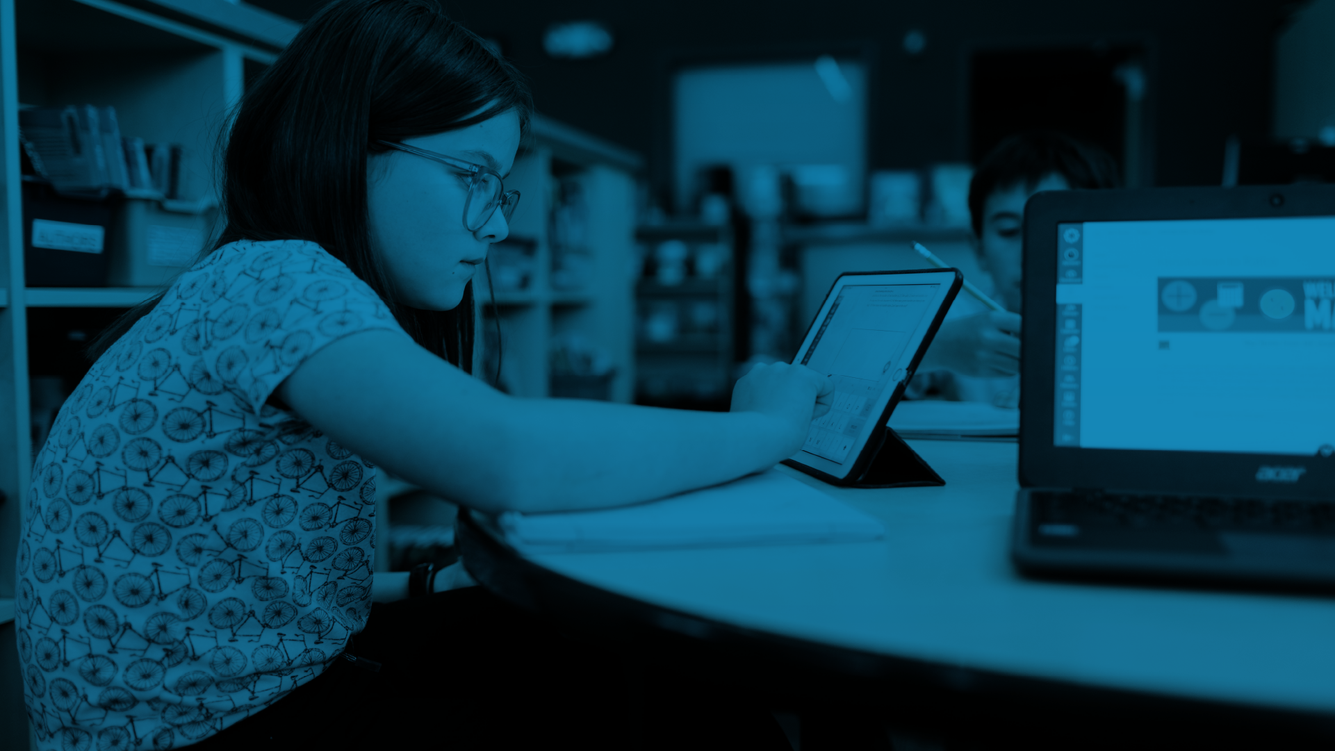 A student opening Canvas on a tablet