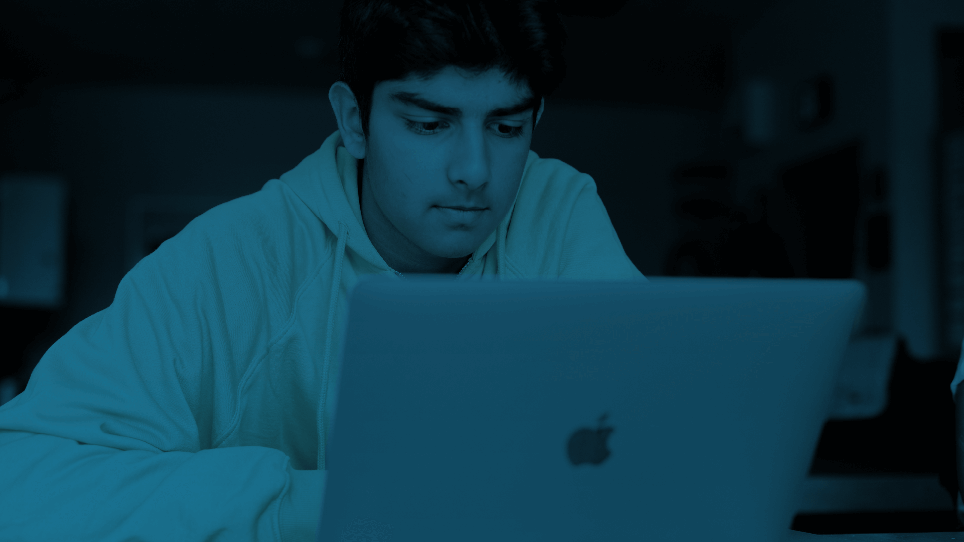 A student using a laptop 
