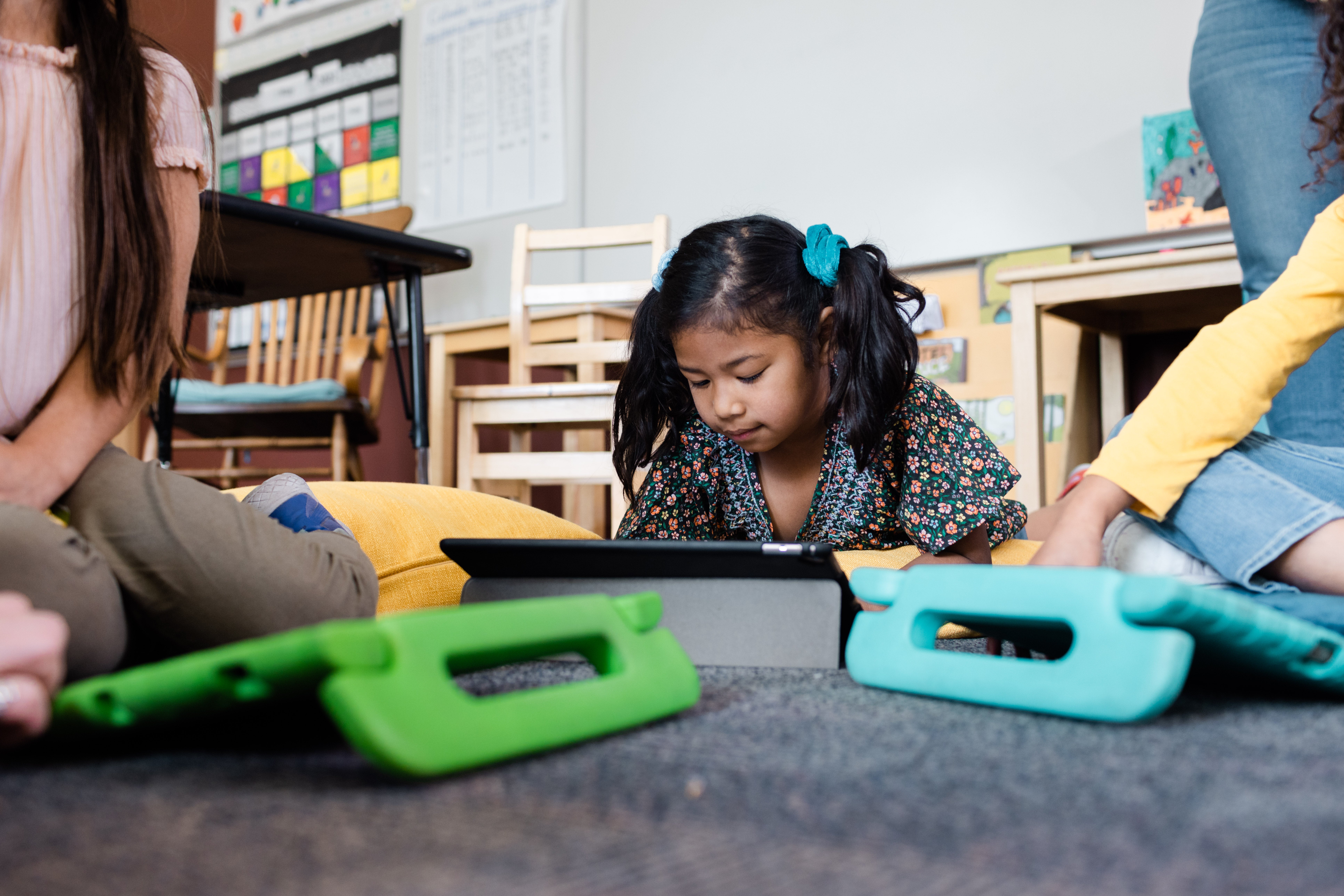 students on tablets