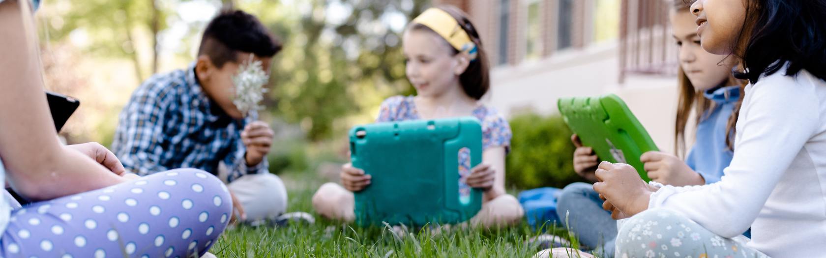 students on tablets