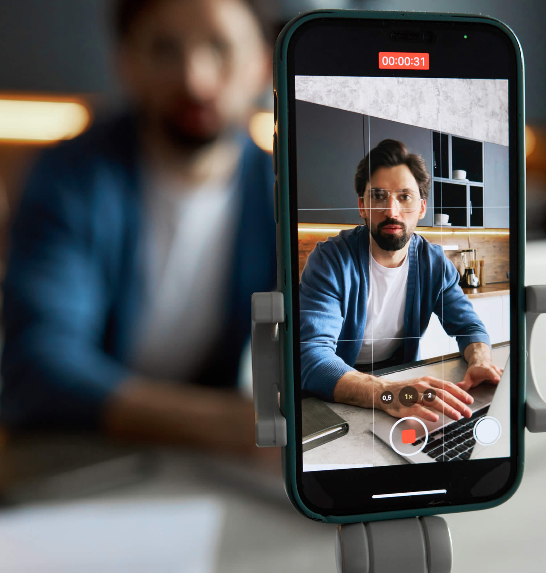 man being recorded on phone
