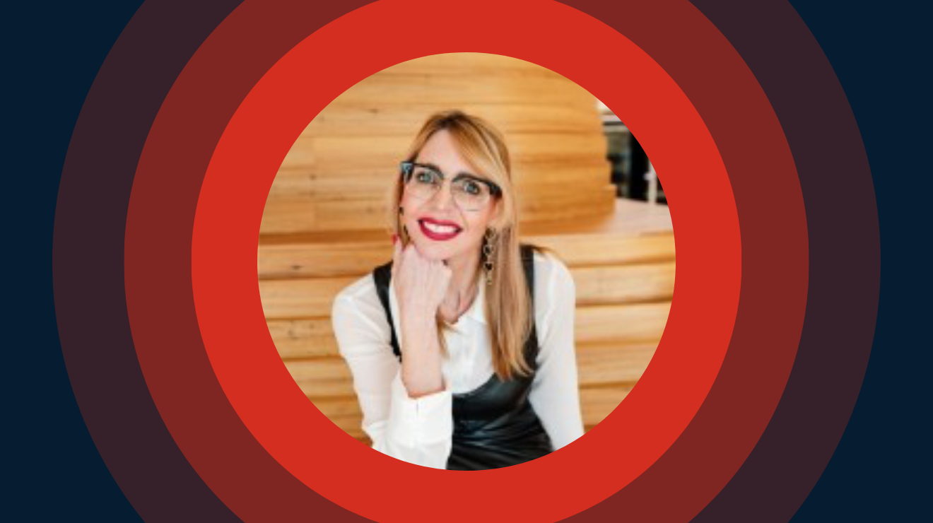 A woman wearing glasses is highlighted with a red circle around her.