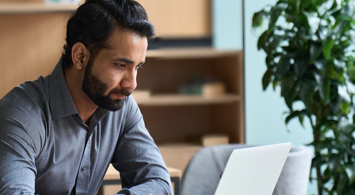 A man using a laptop
