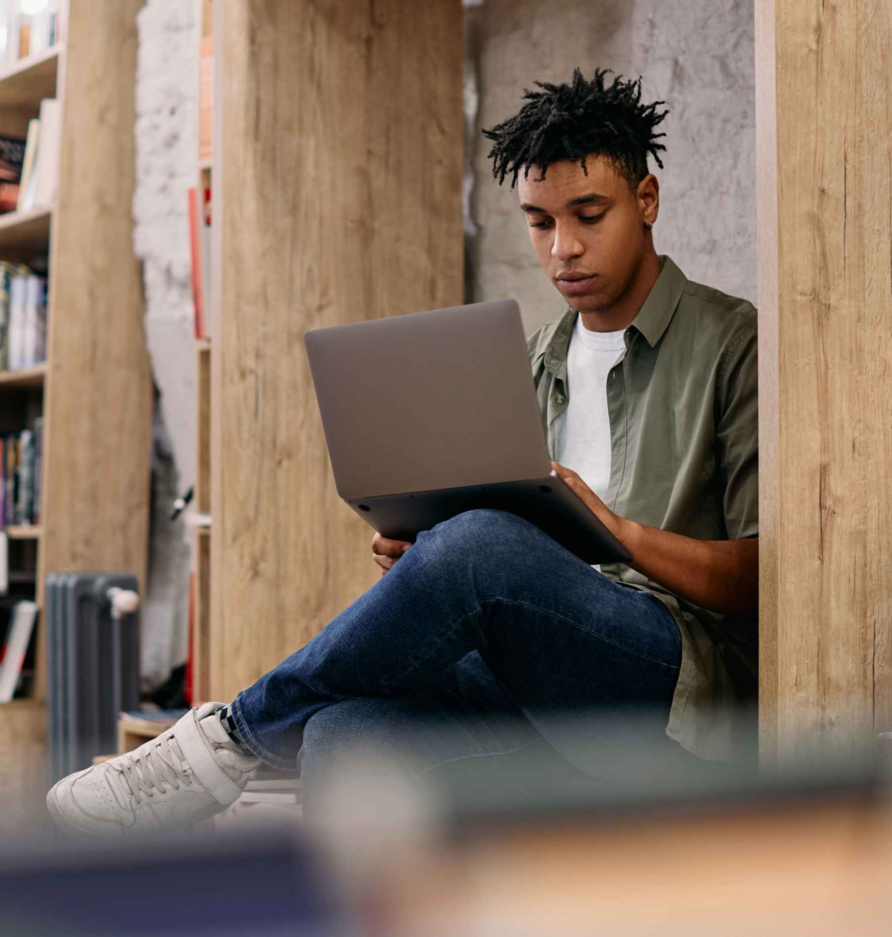 A student using Parchment HigherEd product on a laptop