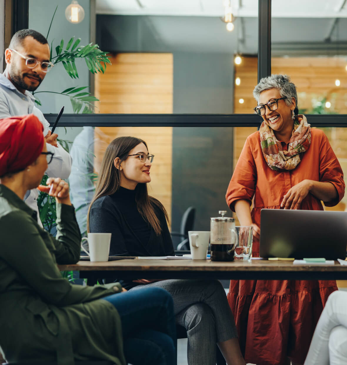 Co-workers chatting in a conference room