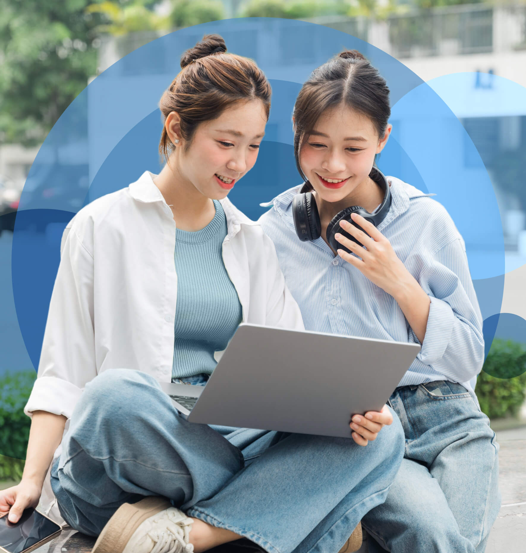 Two students sharing a tablet