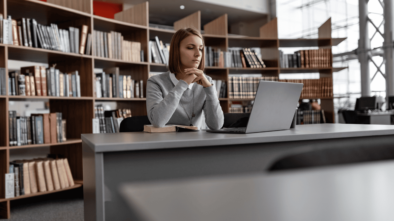 woman looking at a laptop