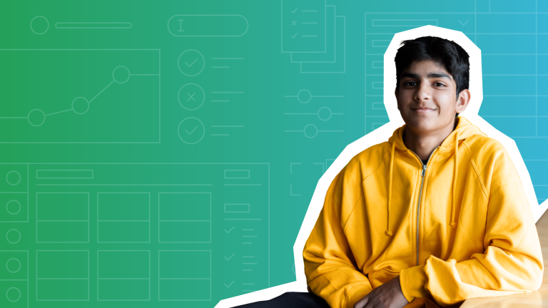 Student in a yellow hoodie seated in front of a blue/green gradient 