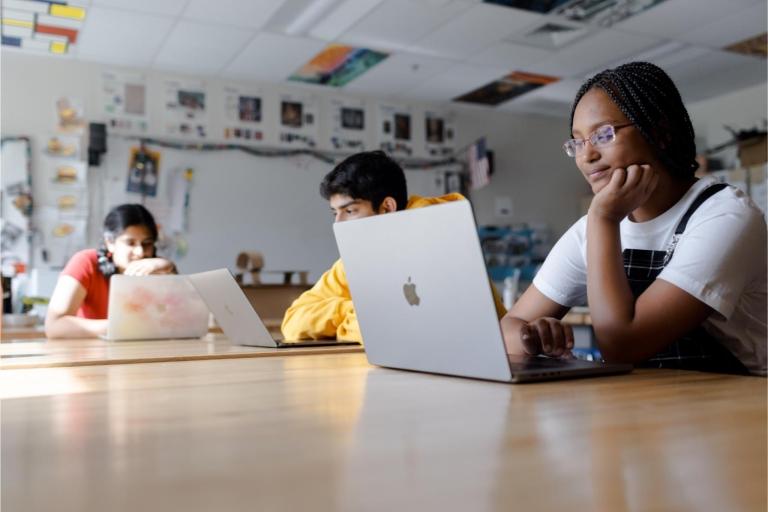 students on tablets