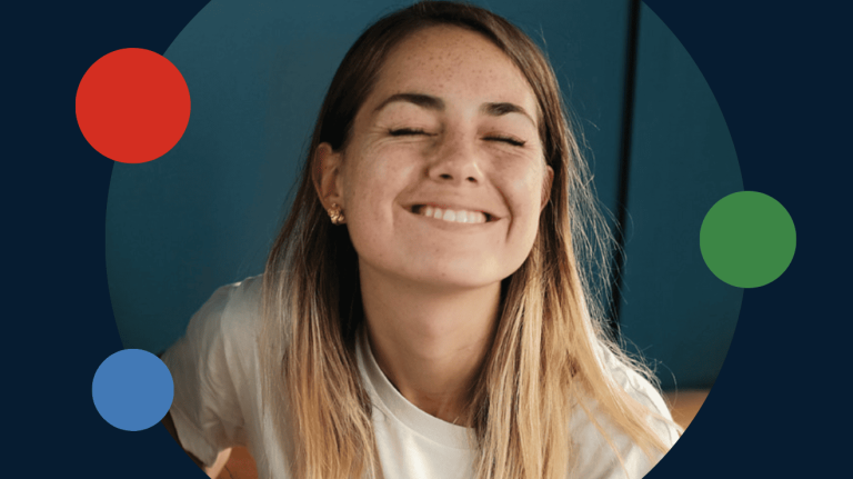 Smiling university student with closed eyes, showing joy and confidence—symbolizing student success and engagement.
