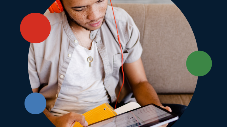 A man studying on a tablet