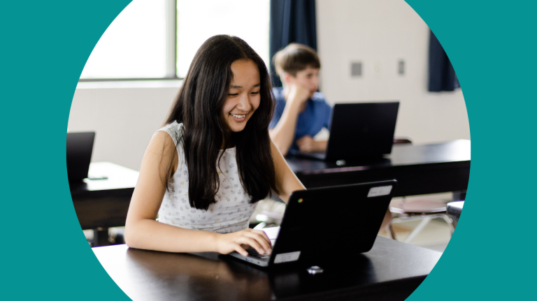 A student using a laptop