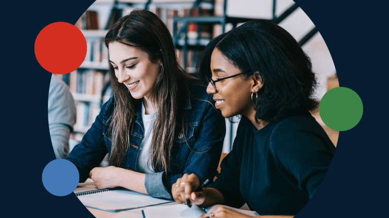 two women working together