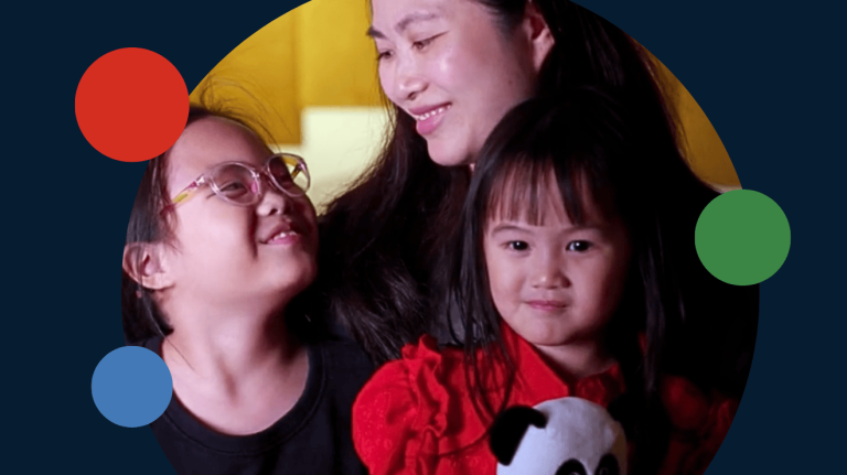 A photo of a Yamaha Malaysia parent with her two daughters