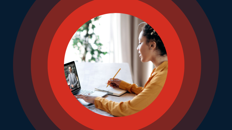 a high school student watches a video lesson in Canvas Studio on a laptop