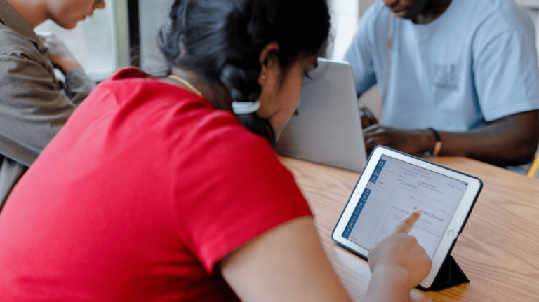 Student using Canvas in a tablet