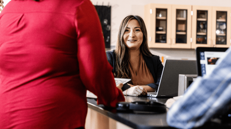 woman smiling at someone 