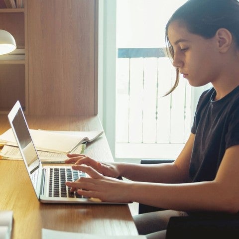 girl working on laptop