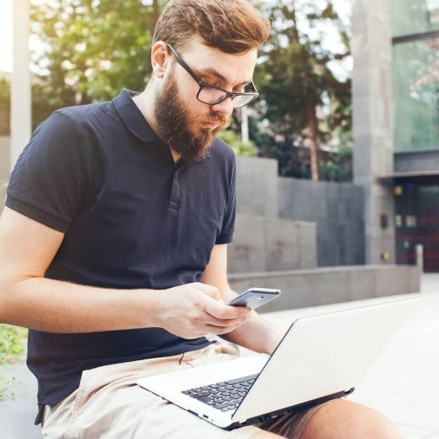 man using devices