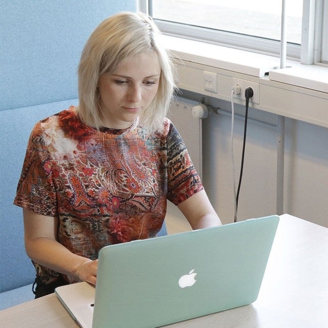 Person working on computer at desk