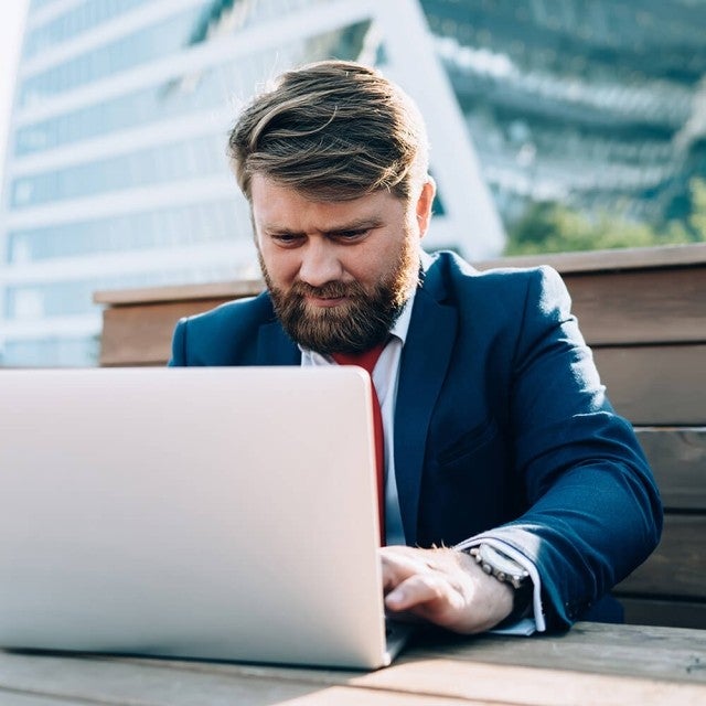 man using laptop