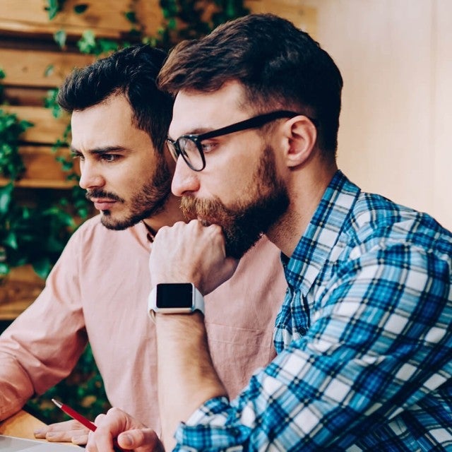 men working together