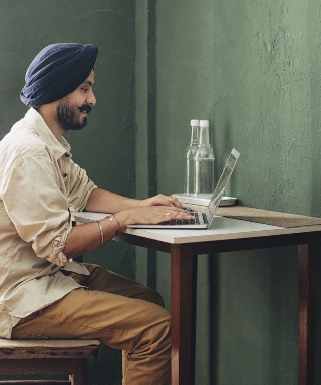 man using laptop