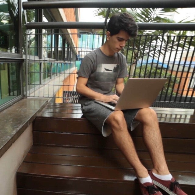 boy using laptop