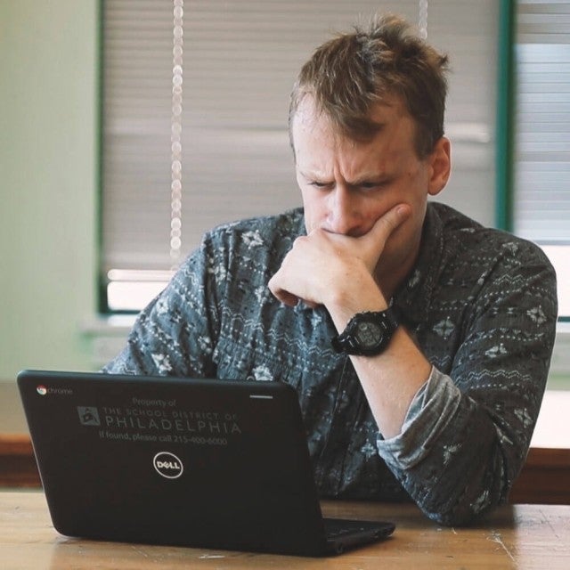 man working on laptop