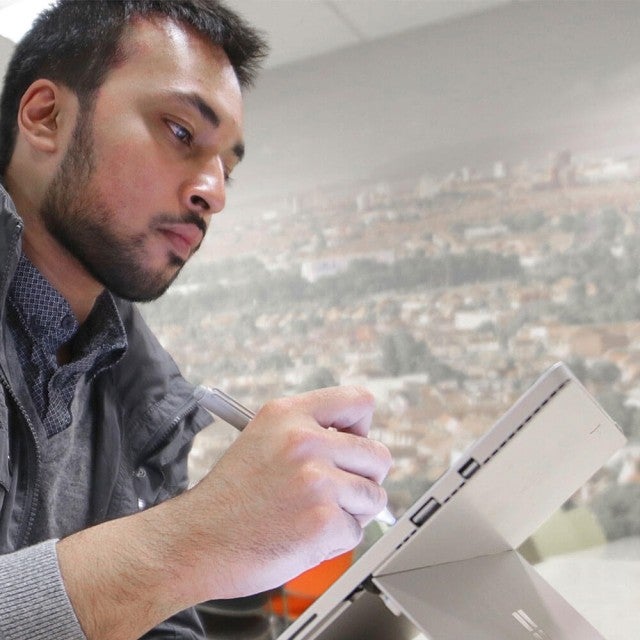 man using laptop