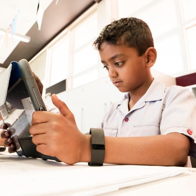 student using a device