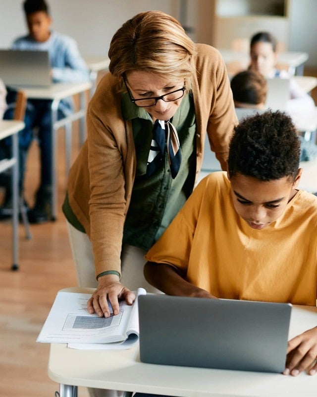 MasteryView Assessment Teacher and Student in Classroom