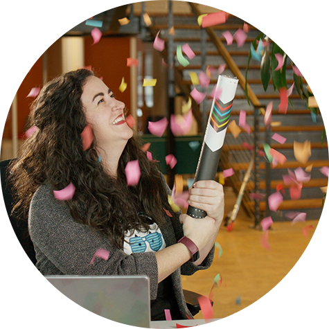 A woman throwing a confetti