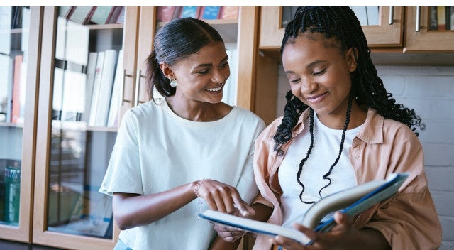 A Higher Ed student studiying