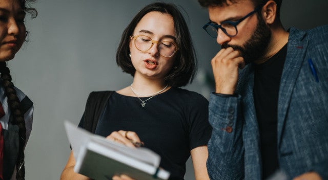 Adults discussing work 